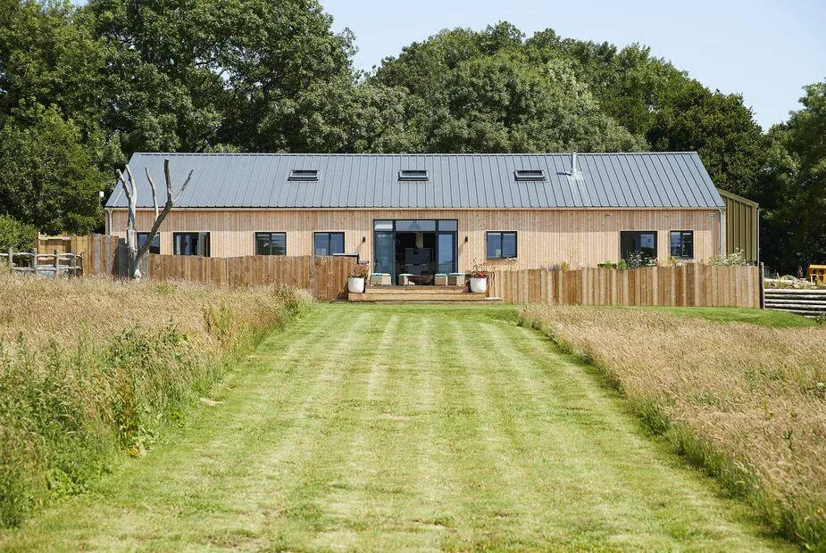 Bokes Barn, Hawkhurst with long lawn approach and large patio doors