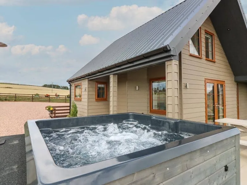 Garden Studio with a private hot tub outside and countryside views