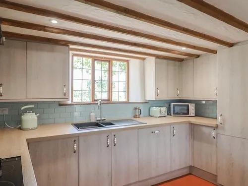 Fully equipped rustic-style kitchen