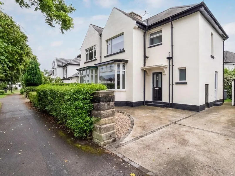 Stylish Hot Tub House white semi-detached exterior with black front door and private driveway