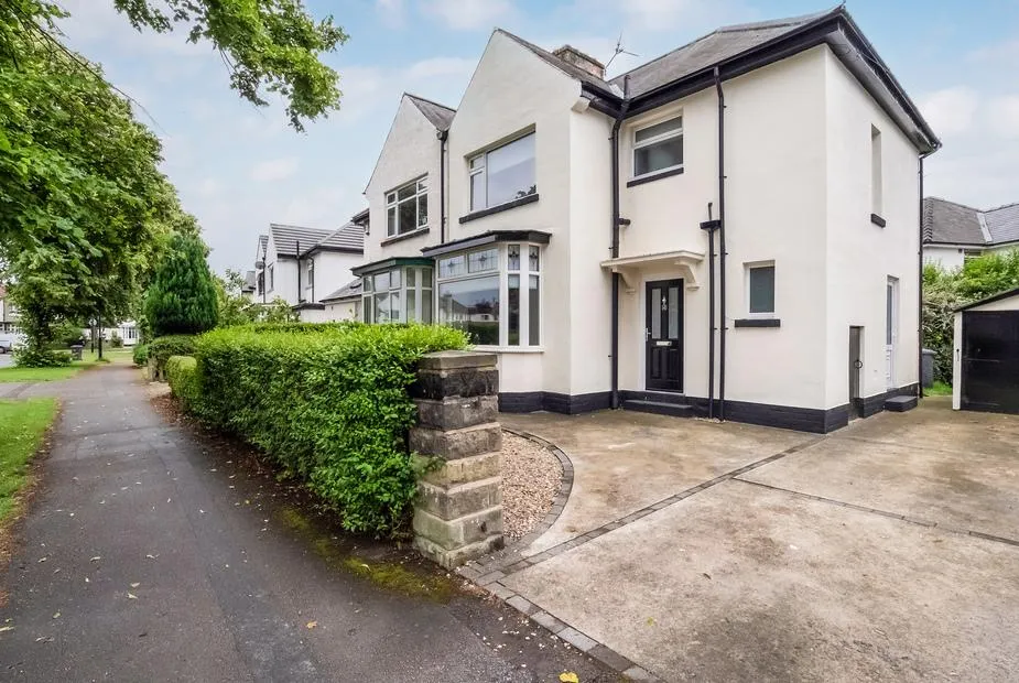 Stylish Hot Tub House white semi-detached exterior with black front door and private driveway