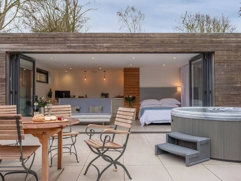 The Garden Room with open-plan interior and patio hot tub